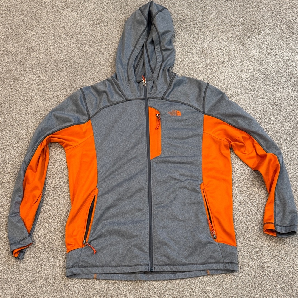 The North Face Zip Lightweight Hooded Runners Jacket.